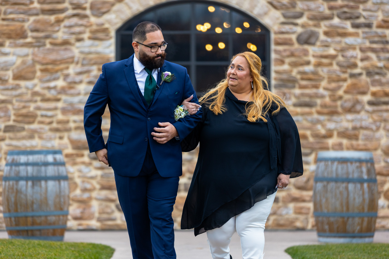 Groom Cris walking with his Mother - Wedding Photography at Folino State Winery in Kutztown, PA